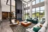 Inviting clubhouse with a cozy fireplace at Abberly Liberty Crossing Apartments in Charlotte, NC
