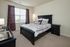 Spacious Bedroom With Large Window at Abberly Village Apartments in West Columbia, SC