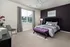 Modern Bedroom With Ceiling Fan at Abberly Village Apartments in West Columbia, SC