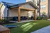 Courtyard featuring cornhole and ample lounge chairs at Abberly Liberty Crossing Apartments in Charlotte, NC