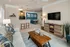 Living Room with Ceiling Fan at Abberly Pointe Apartments in Beaufort, SC