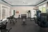 Fitness Center with Strength Training and Cardio Equipment at Abberly Pointe Apartments in Beaufort, SC