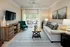 Living Room with Access to Patio at Abberly Pointe Apartments in Beaufort, SC