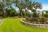 Garden with Stone Retaining Wall and Flowers at Abberly Pointe Apartments in Beaufort, SC