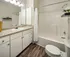 Large Vanity with White Cabinetry in Bathroom at Abberly Woods Apartments in Charlotte, NC