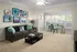 Large Inviting Living Room with Sunroom  at Abberly Woods Apartments in Charlotte, NC