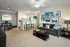 Living Room with Ceiling Fan and Triple Crown Molding at Abberly Woods Apartments in Charlotte, NC