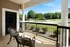 Private Balcony with Views of Gorgeous Landscaping at Abberly Woods Apartments in Charlotte, NC