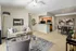 Living Area with Expansive 9 Foot Ceilings with Triple Crown Molding at Abberly Woods Apartments in Charlotte, NC