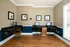 Business center featuring multiple computer workstations with ergonomic chairs designed for productivity in a comfortable setting at Abberly Woods Apartments in Charlotte, NC