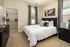 Bright Bedroom with Walk In Closet and an Abundance of Natural Lighting at Abberly Woods Apartments in Charlotte, NC