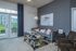 Spacious Living Room With Private Balcony at Abberly Waterstone Apartments in Stafford, VA