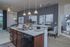 Mocha Wood Cabinets and Brushed Nickel Hardware at Abberly Waterstone Apartments in Stafford, VA