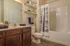 Wood-Plank Style Flooring in Baths at Abberly at Southpoint Apartments in Fredericksburg, VA
