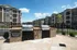 Outdoor Space Grilling Kitchen at Abberly at Southpoint Apartments in Fredericksburg, VA