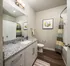 Bathroom interior at Abberly Market Point Apartments in Greenville, SC