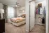Bedroom and closet at Abberly Market Point Apartments in Greenville, SC