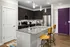 Kitchen with granite countertops at Abberly Noda Vista Apartments in Charlotte, NC