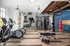 A gym with cardio equipment and free weights at Abberly Noda Vista Apartments in Charlotte, NC