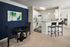 Fitted Kitchen with Bar Seating at Abberly Green Apartments in Mooresville, NC