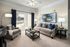Living Room with Balcony at Abberly Green Apartments in Mooresville, NC