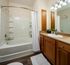 Bathroom With Large Vanity at Abberly Green Apartments in Mooresville, NC