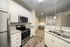 Remodeled Kitchen with Modern Appliances at Abberly Green Apartments in Mooresville, NC