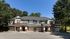 Exterior View with Attached Garages at Abberly Green Apartments in Mooresville, NC
