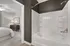 Large Garden Tub In Master Bathroom with A Tile Surround at Abberly Avera Apartments in Manassas, VA