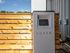 The entrance to the package acceptance room, featuring a secure door with a keypad entry system at at Abberly Alston Apartment Homes and Townhomes in Cary, NC