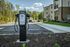 An electric car charging station with multiple charging ports, providing a convenient spot for residents to charge their electric vehicles at Abberly Alston Apartment Homes and Townhomes in Cary, NC