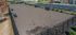 An aerial view of the dog park with seating at Abberly Alston Apartment Homes and Townhomes in Cary, NC