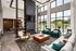 Inviting clubhouse with a cozy fireplace at Abberly Alston Apartment Homes and Townhomes in Cary, NC