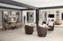 A resident clubhouse filled with furniture and a large chandelier at Abberly Alston Apartment Homes and Townhomes in Cary, NC