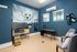 A pet spa featuring grooming stations, a washing area, and comfortable spaces for pets to relax and be pampered at Abberly Alston Apartment Homes and Townhomes in Cary, NC