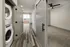 Open laundry room featuring a washer and dryer at Abberly Foundry Apartments in Nashville, TN