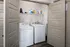 Convenient laundry room featuring a washer and dryer at Abberly Foundry Apartments in Nashville, TN