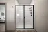Modern walk-in shower featuring white tile and a glass door at Abberly Foundry Apartments in Nashville, TN