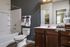Bathroom With Bathtub at Abberly Square Apartments in Waldorf, MD