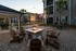 Outdoor Grilling and Entertainment Area at Abberly Crossing Apartments in Ladson, SC
