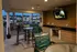 Outdoor Kitchen with TV at Abberly Crossing Apartments in Ladson, SC