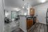 Modern kitchen and spacious living room at Abberly Crest Apartments in Lexington Park, MD