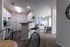 Modern kitchen and living room at Abberly Crest Apartments in Lexington Park, MD