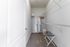 Spacious walk-in closet with ample storage, modern design, and organized shelving at Abberly Crest Apartments in Lexington Park, MD