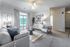 Spacious living room with modern furnishings at Abberly Crest Apartments in Lexington Park, MD