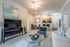 Spacious living area with modern furnishings at Abberly Crest Apartments in Lexington Park, MD