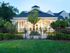 Building with Beautiful Landscaping at Abberly Crest Apartments in Lexington Park, MD