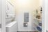 Convenient washer and dryer in a laundry room at Abberly Crest Apartments in Lexington Park, MD