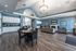 Clubhouse with table and chairs at Abberly Crest Apartments in Lexington Park, MD