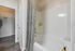 Luxurious bathroom with a large garden tub and a walk-in closet at Abberly Crest Apartments in Lexington Park, MD